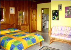 Small Cabin Bedroom at Posada Mimosa