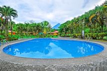 Hotel pool with Arenal Volcano